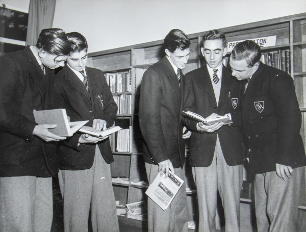 A group of students wearing Norfolk School of Agriculture blazers.