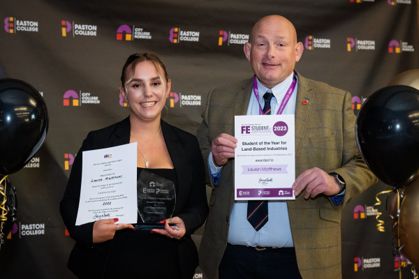Lauren Matthews being presented with the Land Based Student of the Year Award by Mat Scott Director of Land Based Industries at Easton College credit David Kirkham